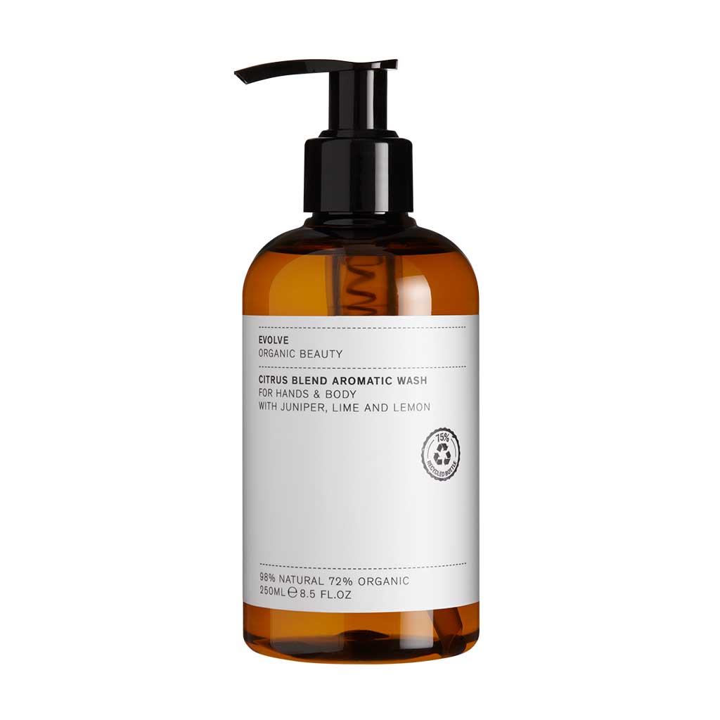 Citrus Blend Aromatic Non Toxic Hand & Body Wash in an amber bottle with a black topper from Evolve Organic Beauty 