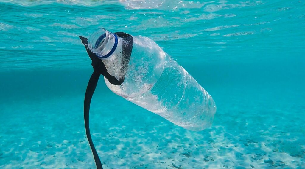 Plastic bottle in the ocean