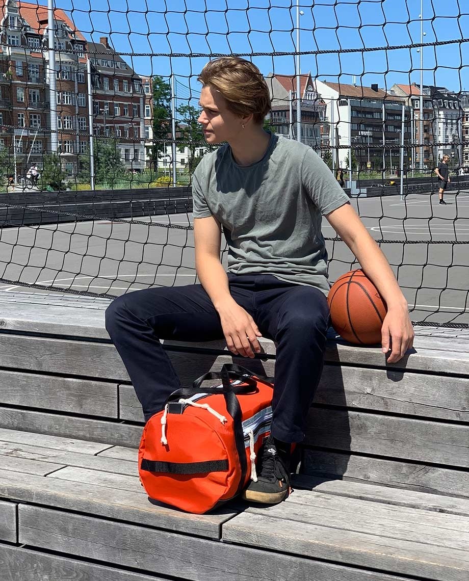 Stay prepared and sustainable with the GRUNBAG Viking Lifebag Sport Gym Bag, crafted from upcycled liferaft materials for ultimate durability and eco-friendliness.